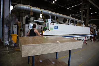 Panel processing machinery and materials in the Sierra workshop